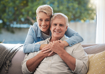 Image showing Couple, love and senior man and woman sitting on a sofa in the living room and enjoying retirement. Portrait of an elderly male and female pensioner in a home to relax and spend time together