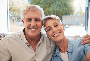 Image showing Retirement portrait of happy senior couple relax on a sofa together in their living room or summer holiday house. Smile, affection and love with elderly or pension people on a couch enjoying break