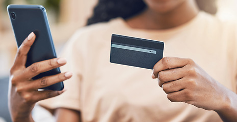 Image showing Black woman with a phone uses credit card for digital, online shopping and to buy ecommerce goods. Web security technology makes paying bills using fintech easy, simple and safe for retail customers