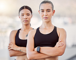 Image showing Fitness women, workout friends and exercise during athlete training, running and health goals while looking serious and ready outside. Portrait of female wellness partners together for accountability