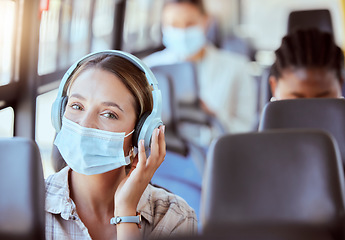 Image showing Covid, travel and music for woman on bus journey or transportation with mask for safety against covid 19 virus. Portrait of relax young girl with headphones streaming or listening to radio podcast