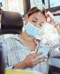 Image showing Covid face mask, transport and woman with smartphone reading news online in bus and sunshine lens flare. Travel person with cellphone on mobile chat app, social media or internet information on train