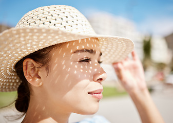 Image showing Summer, travel and beach sun hat by woman looking content, relax and calm, enjoying fresh air and free time. Nature, light and closeup of female on vacation in Florida, enjoy tropical view and ocean