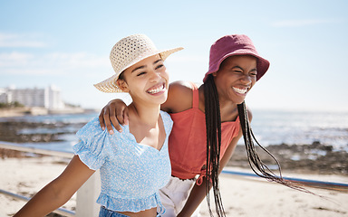 Image showing Smile, love and gay or lesbian with black couple women bonding at beach or sea in summer. Freedom, happy and LGBT portrait of fun friends or girlfriend on holiday, vacation or honeymoon by the coast