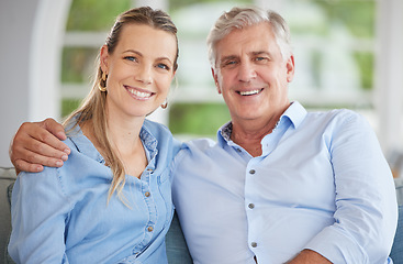 Image showing Love, family and portrait of father and daughter relax on a sofa, bonding and sitting in a living room together. Happy, smile and hugging parent and woman enjoying quality time on the weekend at home