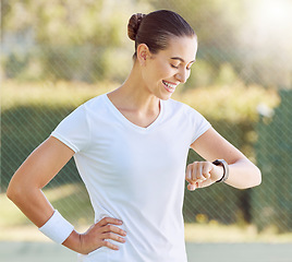 Image showing Woman with watch relax after exercise, fitness or sports training for cardio, health and body wellness. Young girl, athlete or marathon runner with stopwatch pause to check workout running time time
