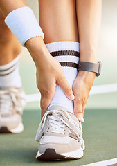 Image showing Sports, fitness and pain on woman ankle injury from exercise, training or fitness accident on sport court. Zoom of girl athlete health risk, muscle injury or wound from workout at sport club.