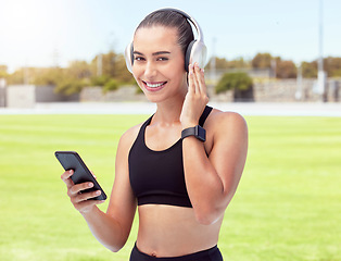 Image showing Woman fitness runner listening to music, 5g phone for motivation, wellness or training outdoor sport or event. Girl sports athlete workout, running and podcast or radio exercise for cardio at stadium