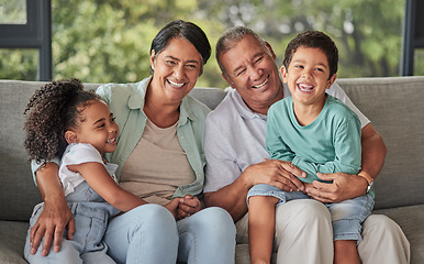 Image showing Love, happy family and children bonding with grandparents on sofa at home, laugh and having fun in their family home. Relax, play and excited kids embracing and enjoying a visit to grandparent home