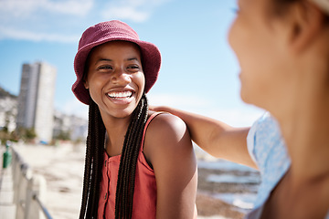 Image showing Black woman, summer and bonding with friends by beach, ocean and sea in Miami, Florida. Smile, happy or relax fashion tourist, students or people laughing in city travel location for holiday vacation