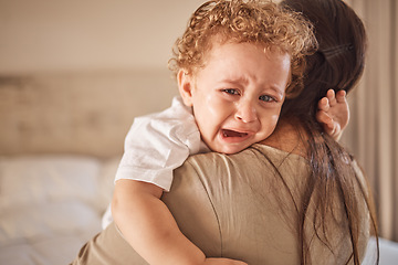 Image showing Mother and crying baby in a bedroom with portrait of sad son looking upset at nap time. Children, love and insomnia with baby boy comfort by loving parent, embracing and bond in their home together