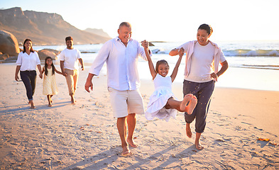 Image showing Relax, travel and happy with big family at the beach on Mexico vacation with love, support and summer. Sunset, nature and trust with grandparents, children and parents holding hands on holiday