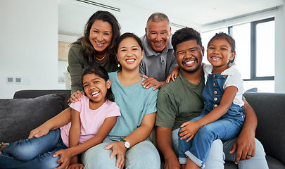 Image showing Family, children and love with kids, grandparents and parents sitting on a sofa in the living room of their home during a visit. Happy, smile and together with a senior man, woman and their relatives