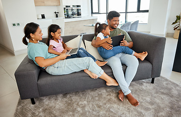 Image showing Family, children and technology with a girl, sister and parents streaming an online subscription service in a living room. Tablet, laptop and internet with a mother, father and daughters in the home