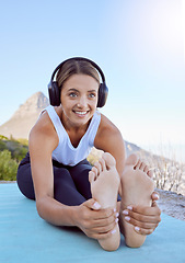 Image showing Outdoor yoga, stretching and woman with headphones listening to wellness podcast or calm music for exercise motivation. Sports person in cardio or pilates workout with audio in nature and lens flare