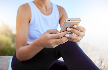 Image showing Relax, fitness and social media mobile girl connection with 5g technology typing on screen. Workout woman on smartphone for outdoor rest break with internet app connectivity in nature.