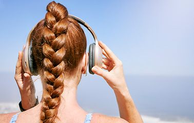 Image showing Fitness, nature and woman listening to music during exercise, health and cardio workout with scenic views. Radio, podcast and streaming with rear view of female prepare for zen and relax meditation