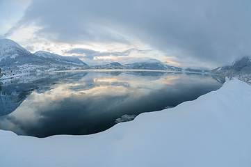 Image showing Snowy Mountains and Body of Water