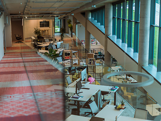 Image showing Empty modern glass startup office the space exudes a sleek and innovative atmosphere, ready to be filled with the potential of entrepreneurial endeavors