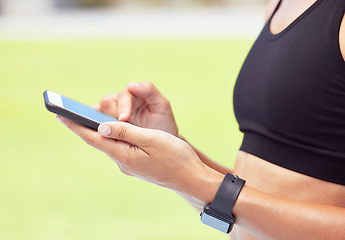 Image showing Fitness woman, phone app and hands of sports outside for exercise, training and workout for health and fitness. Closeup of active female athlete runner tracking progress for cardio steps and wellness