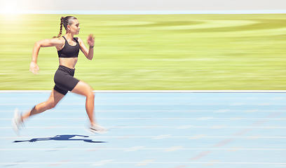 Image showing Runner woman and marathon training on stadium track for athlete competition exercise commitment. Fitness, wellness and workout girl sprint and speed for athletic performance practice.