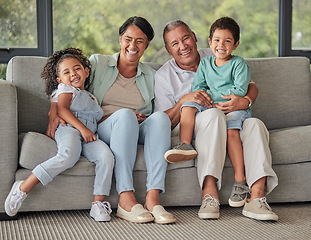Image showing Laughing grandparents, children and bonding on sofa in Brazil house or home living room in trust, security or safety. Family portrait, smile or comic kids with retirement senior man and woman support