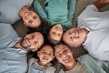 Image showing Family floor, happy portrait and grandparents in retirement with children, crazy and comedy together in the living room of home. Kids and parents with smile for weekend with elderly people in house