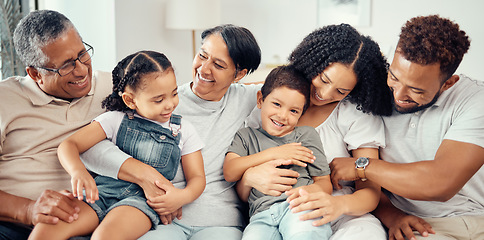 Image showing Portrait, children with grandparents in a big family as mother and father hugging boy on the sofa or couch. Dad mom and young kids happy to enjoy bonding with lovely grandmother and old man at home