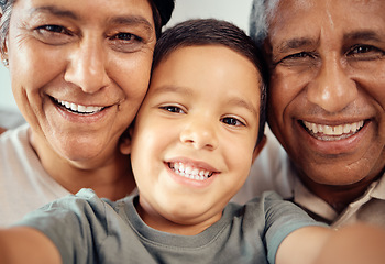 Image showing Boy take selfie with happy grandparents, together in closeup or zoom portrait in house. Latino male child smile with grandma and grandpa in macro with expression of happiness and love in family home