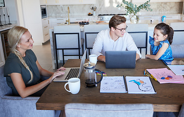 Image showing Home education, laptop and family working online at the table together in the dining room. Mother doing a business project while father helping child with online school or elearning on a computer.