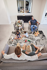 Image showing Family, relax and children playing with toys on the floor in the living room while bonding. Calm grandparents and parents resting while watching the kids play together in the lounge of their home.