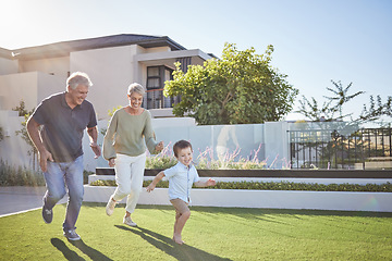 Image showing Family running, happy garden and child happy on grass with grandparents, smile for exercise in backyard and fitness together in nature. Grandmother and man playing with kid in park by house in summer