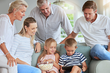 Image showing Streaming, media and family watch tablet movies entertainment on internet mobile app together in living room. Happy family people love watching online reunion film series on technology in home lounge