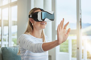 Image showing Futuristic woman with VR headset and digital ai with her hands. Young female with virtual reality goggles app, playing an interactive 360 3D simulation game and experience the metaverse technology