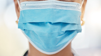 Image showing Healthcare, covid and doctor with surgical mask, face closeup and cropped. Safety in hospital for medical worker in surgery or research. Protection against virus and infection for woman in medicine.