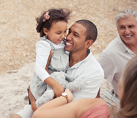 Image showing Father, family and beach this summer, happy to be with his child. People on a picnic on vacation, smiling and baby is happy. Mother, grandfather, dad and young girl on this sunny day.