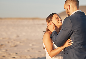 Image showing Love, wedding and bride and groom embrace in celebration of marriage at outdoor venue. Nature, field and couple looking happy and smiling, hug and enjoy relationship with romantic affection and care