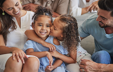 Image showing Sibling love, family and kiss with children sharing a special sister bond while at home with mom and dad for bonding and to relax. Happy latino girl kids or friends sitting with man and dad parents