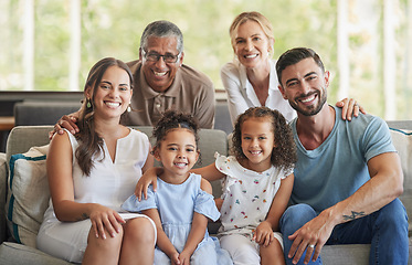 Image showing Happy big family, portrait and smile on sofa in home living room, spending quality time and bonding. Love, support and care of grandparents, parents and girls together on house couch smiling or laugh