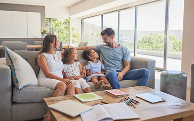 Image showing Happy family, children and parents talking on a sofa, relax and bonding in a living room at home. Love, quality time and affection by interracial family enjoy the weekend and conversation in a house