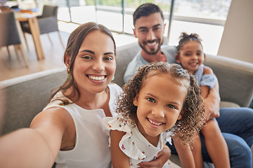 Image showing Happy family, selfie and love on sofa in home living room couch, bonding and caring. Portrait, mom and father, kids or girls from Spain spending quality time in relax, care and support in house.