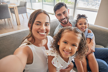 Image showing Happy, smile and selfie portrait of a family relax on living room sofa while bonding, having fun and enjoy quality time together. Love, peace and happiness for mom, dad and kid children from Brazil