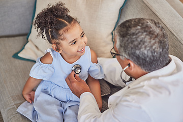 Image showing Home consultation, child and pediatrician with stethoscope doing health check on happy kid patient. Happiness, smile and young girl with medical healthcare worker or medicine doctor doing heart exam