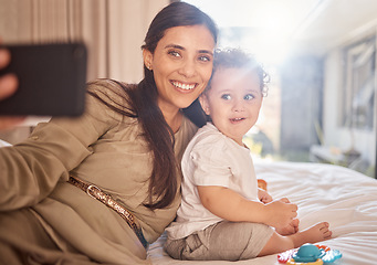 Image showing Smile, selfie and phone with mother and baby relax in bedroom for happy, digital and social media. Family, internet and love with mom and child for memory, lifestyle and wellness at home together