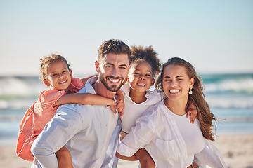 Image showing Happy family, beach portrait and smile on vacation, holiday or summer trip in Brazil. Relax, travel and caring mom, dad and girls walking with piggy back and bonding on ocean, sea and sandy shore.