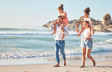 Image showing Ocean, piggy back and couple with kids on a summer holiday at the beach. Love, family and fun, man and woman walking with children in sea sand. Vacation, time together and nature, happy in sunshine.
