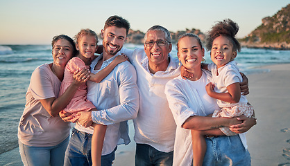Image showing Big family, happy and beach portrait of people with girl children by the sea at sunset. Happiness of a summer vacation with kids spending quality time together on the ocean water waves and sand