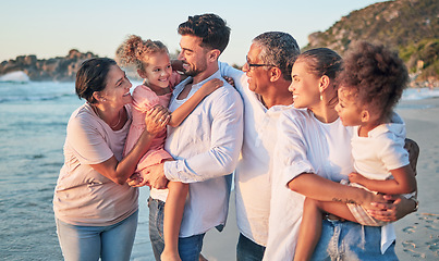 Image showing Happy big family, love and beach holiday in Brazil, vacation or summer trip. Travel, relax and mom, dad and grandparents with girls smile walking, bonding and caring on ocean, sea and sandy shore.
