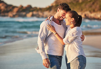 Image showing Travel, tourism and beach vacation with happy couple sharing hug, love and laughing while on holiday by the seaside. French man and woman enjoying exotic honeymoon having fun at tropical destination