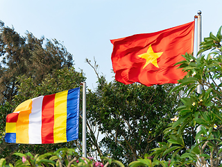 Image showing Buddhist and Vietnamese flags.
